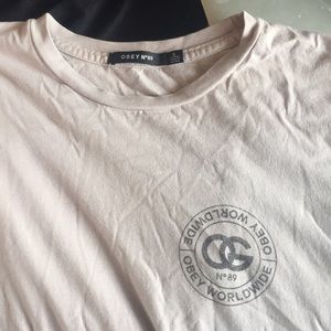 Size small light pinkish grey obey top